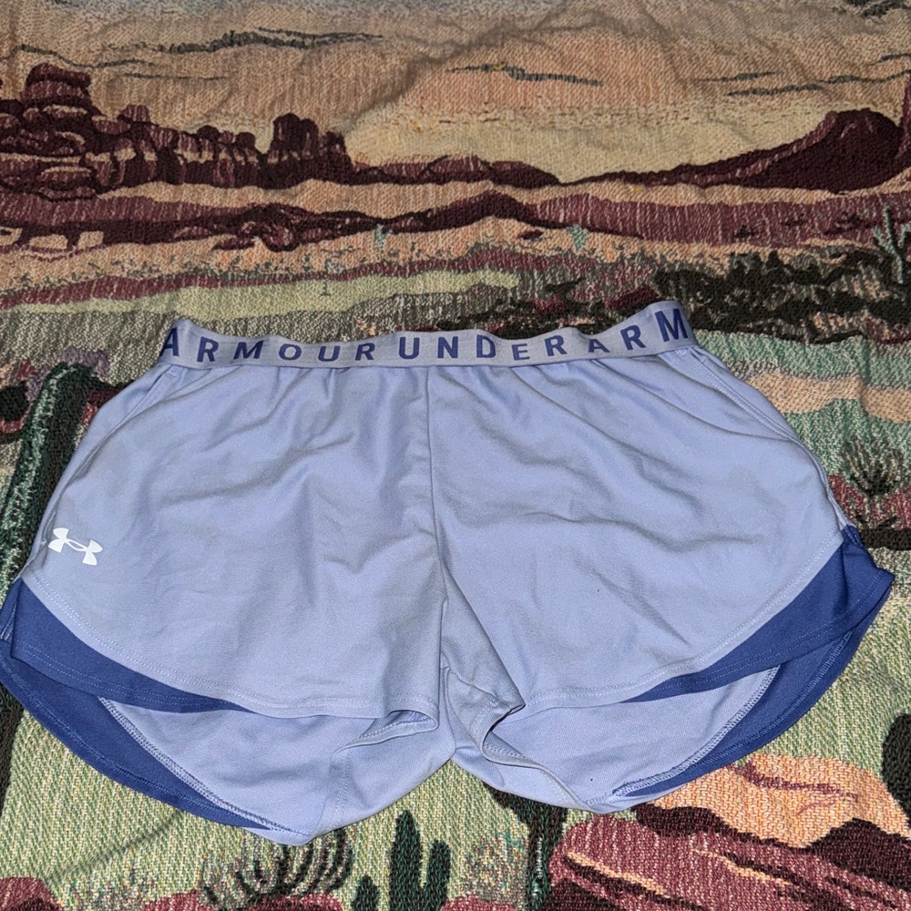 2 pairs of Under Armour shorts